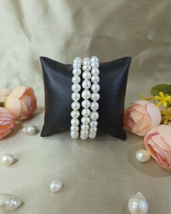 Triple line of white Fresh Water Pearl Bracelet